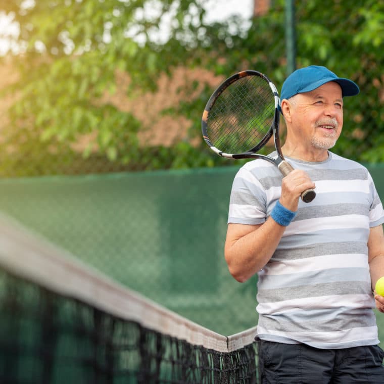Smiling, Sporting, Active Senior Man Playing Tennis In The Outdoor, Sports Pensioner, Sport Concept